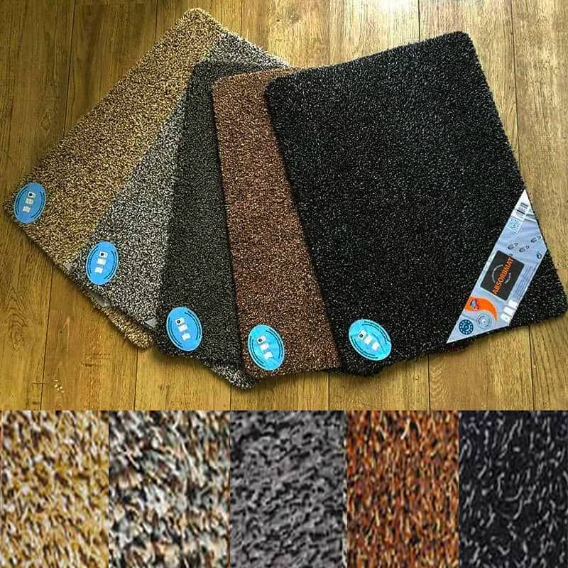 Nettoyer un tapis d'entrée : éliminer les tâches de boue hivernales